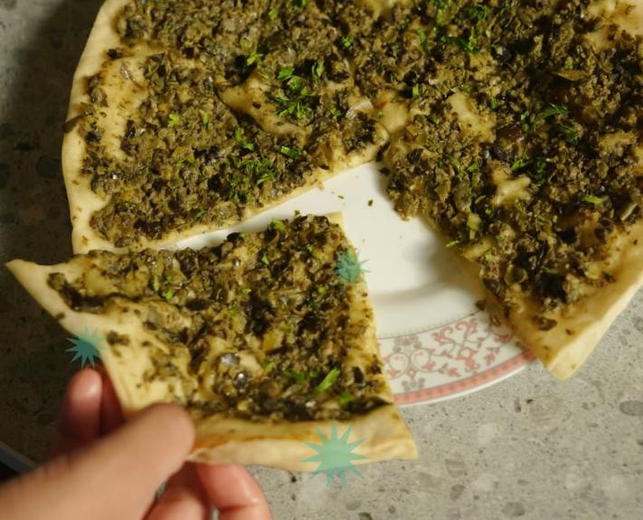 Tapenade spread over flatbread